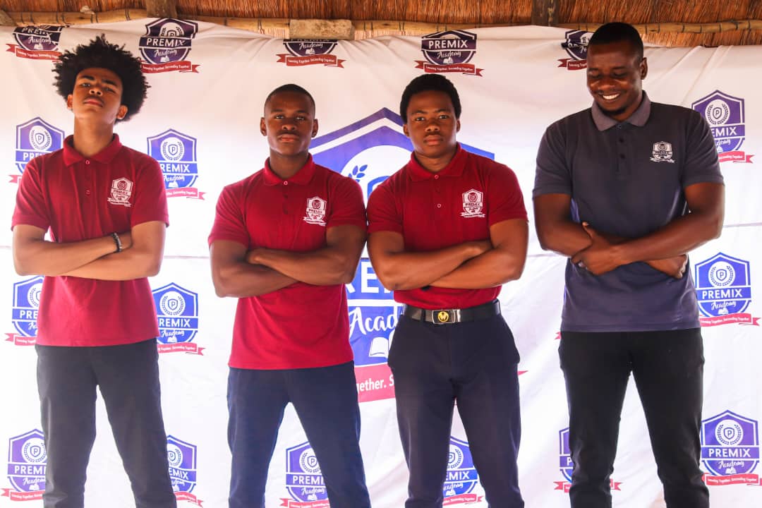 Teacher with students at Premix Academy